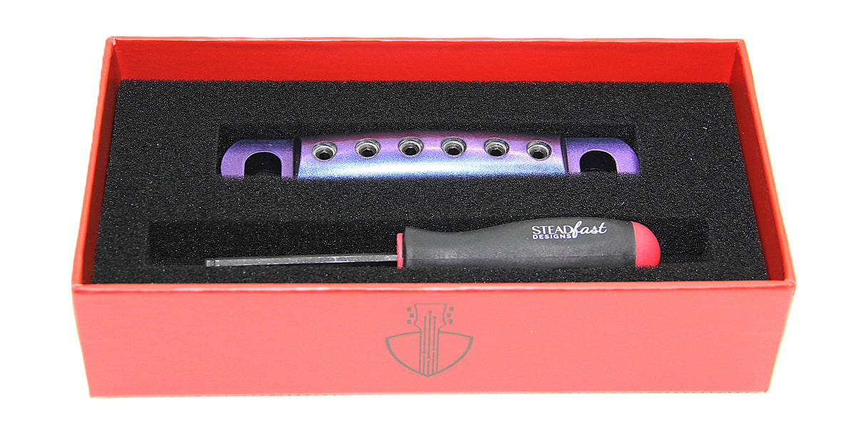 Blue Purple colorshift stopbar for guitars.  Made from lightweight aluminum.  With tool in box.