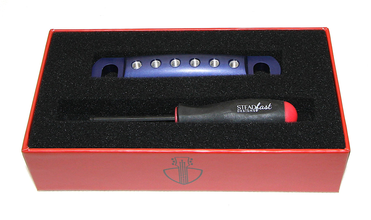 Navy blue anodized Steadfast Stopbar in its presentation box with the Steadfast hex driver. Best Quality