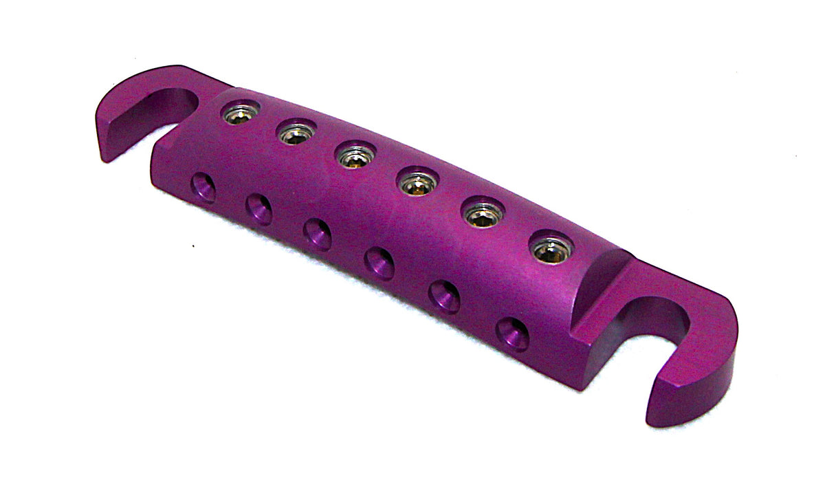 Purple anodized Steadfast Stopbar at an angle, showing the six string-locking set screws. Best Quality