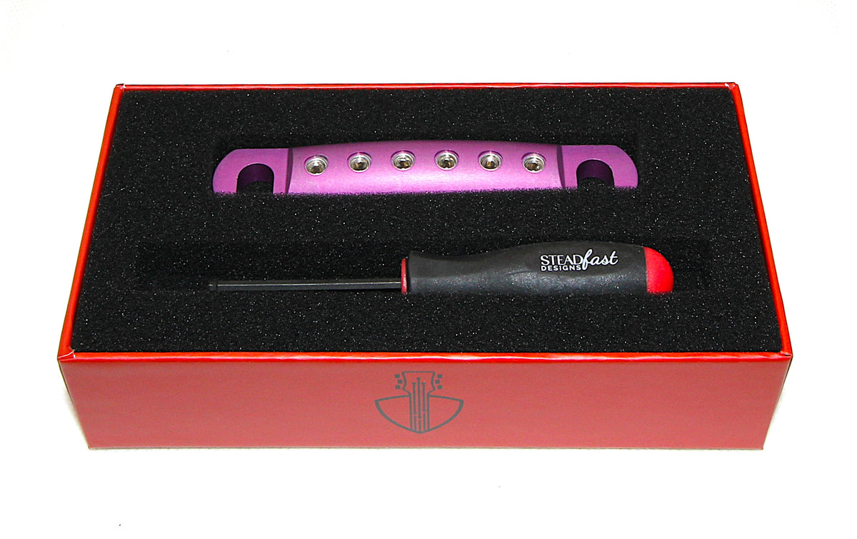Purple anodized Steadfast Stopbar in its presentation box with the Steadfast hex driver. Best Quality
