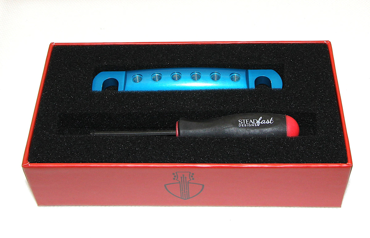 Teal blue anodized Steadfast Stopbar in its presentation box with the Steadfast hex driver. Best Quality